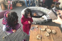 Children doing woodwork at the outdoor classroom